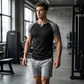 T-shirt de sport pour homme à manches raglan et col fendu en V