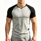 T-shirt de sport pour homme à manches raglan et col fendu en V